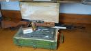 rifle and crate of yugo milsurp ammo